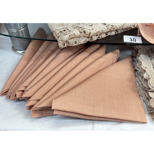 30 - 8 rose pink lily style placemats, 12 matching napkins, 2 ecru lace table runners & a small tableclot... 