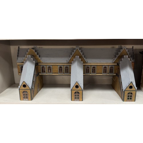 192 - An impressive collection of HO gauge model railway German buildings including Statons Castle, Brande... 