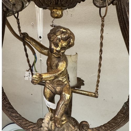 32 - A cherub surmounted gilded metal ceiling light