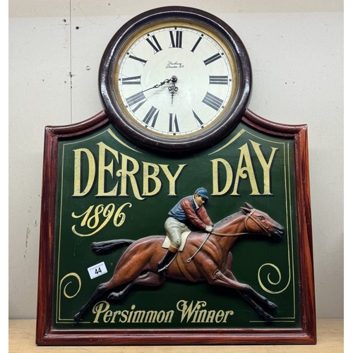 44 - A large painted wooden retro Derby day persimmon winner horse racing quartz wall clock. 60 x 78cm