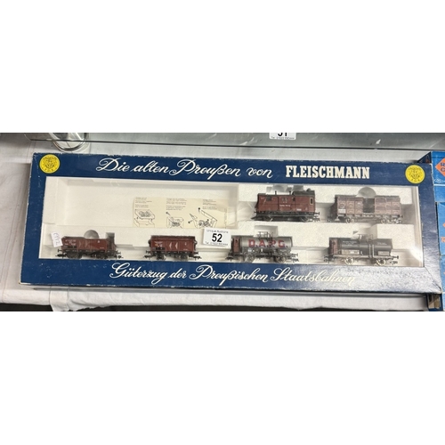 52 - A Fleishmann HO4884 part train set & 3 boxed Roco goods wagons no 4206, 4210, 42075