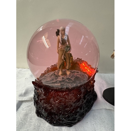 63 - A quantity of figures including Game Of Thrones, Catwoman & Game Of Thrones snow globe