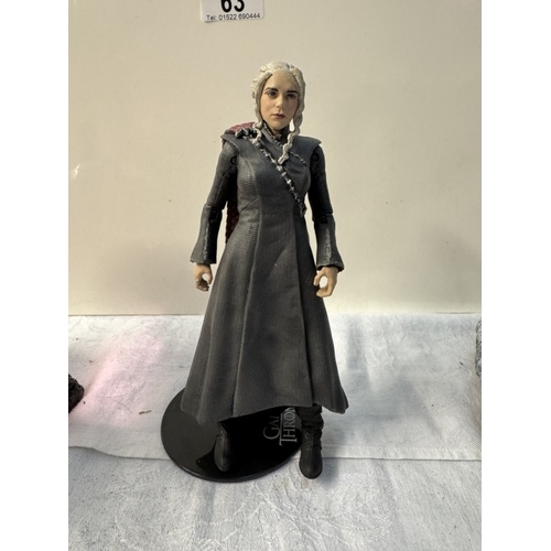 63 - A quantity of figures including Game Of Thrones, Catwoman & Game Of Thrones snow globe