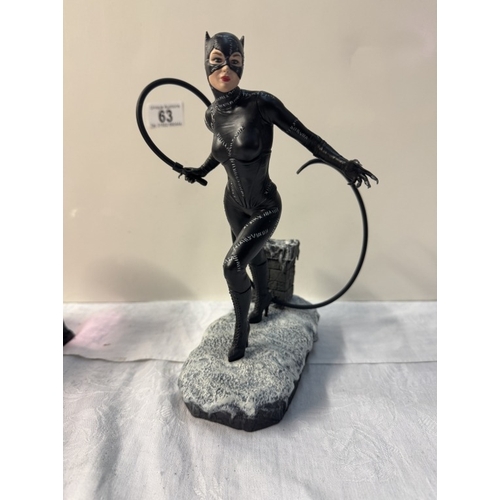 63 - A quantity of figures including Game Of Thrones, Catwoman & Game Of Thrones snow globe