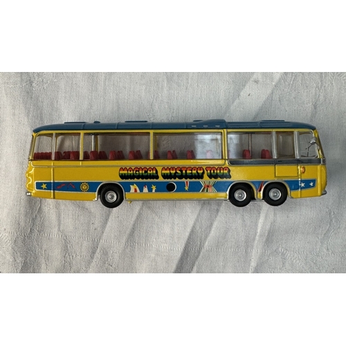 66 - A rare The Beatles yellow submarine model & later Magical Mystery Tour bus & figures