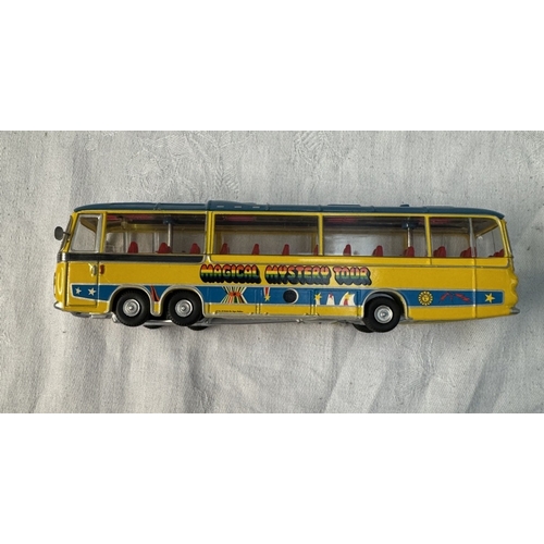 66 - A rare The Beatles yellow submarine model & later Magical Mystery Tour bus & figures