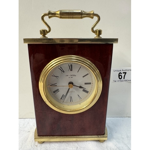 67 - A Widdop mahogany & brass quartz mantle clock