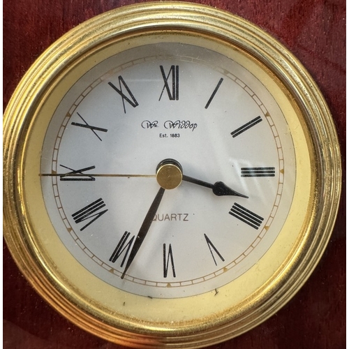 67 - A Widdop mahogany & brass quartz mantle clock