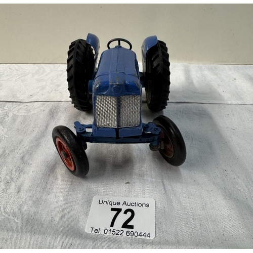 72 - A large vintage Empire made Fordson Major diecast tractor. Length 14cm (Steeing arm A/F)