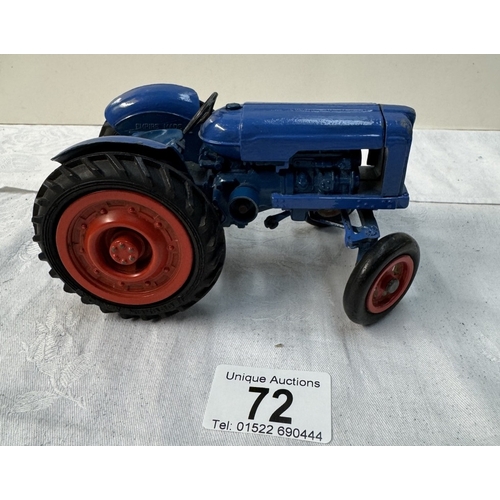 72 - A large vintage Empire made Fordson Major diecast tractor. Length 14cm (Steeing arm A/F)