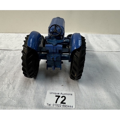 72 - A large vintage Empire made Fordson Major diecast tractor. Length 14cm (Steeing arm A/F)