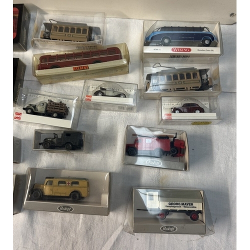 77 - A quantity of boxed HO gauge plastic vehicles including Wiking, Preiser & Roskof