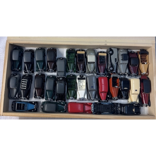 78 - 5 boxed of HO gauge plastic military vehicles & vans in wooden boxes