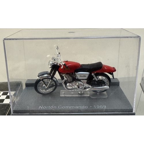 106 - A quantity of boxed motorcycle models including Norton, Vincent, Royal Enfield etc & A boxed scooter... 