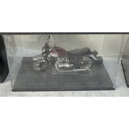 106 - A quantity of boxed motorcycle models including Norton, Vincent, Royal Enfield etc & A boxed scooter... 