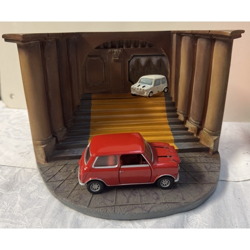 108 - A boxed Corgi Italian Job diorama & A three piece Mini set