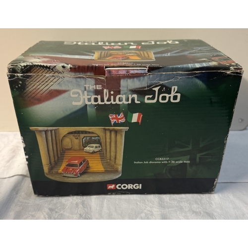 108 - A boxed Corgi Italian Job diorama & A three piece Mini set