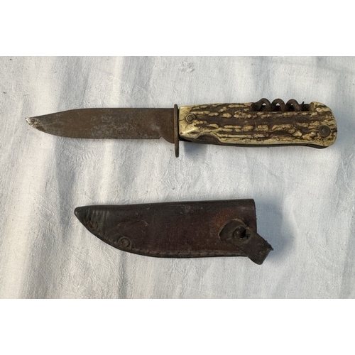 110 - A vintage carved antler grip skinning knife with corkscrew & decora Solingen blade & 2 Swiss multi t... 