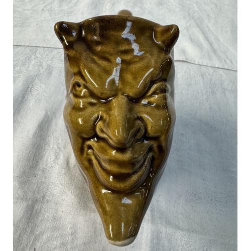 111 - A studio pottery pipe with a devil head bowl