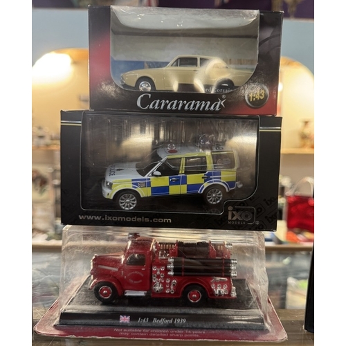 114 - A quantity of boxed Diecast by various makers including IXO, Signature series, Fire engines etc