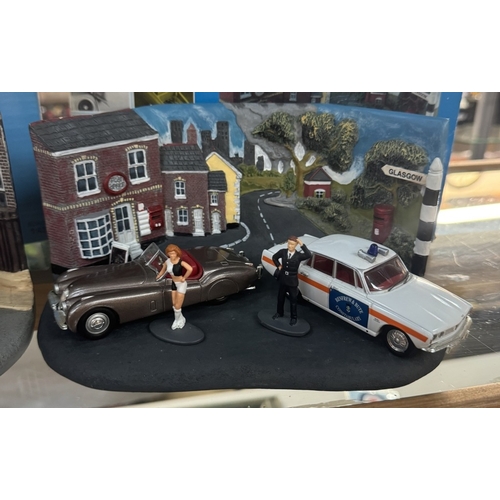 115 - 2 Boxed Vanguard limited edition dioramas including Rover 3500 V8 & Rover 2000, Jaguar XK120