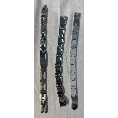 85 - 10 New stainless steel bracelets