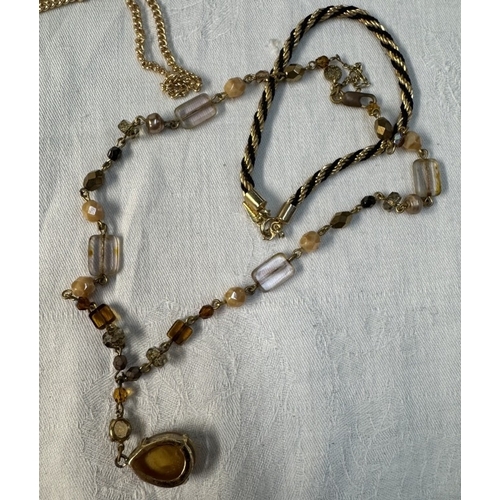 90 - A quantity of yellow metal & pearl necklaces & bracelets