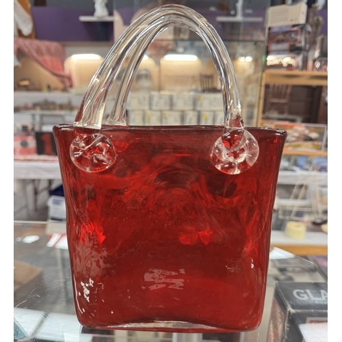 123 - An art glass red ladies handbag