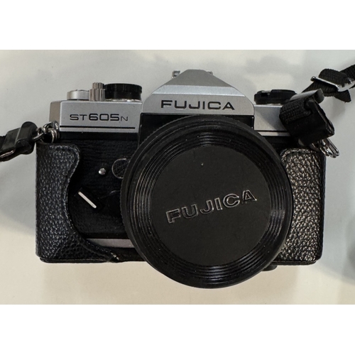 126 - A Fujica camera with case & A lens