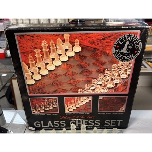 128 - A boxed glass chess set