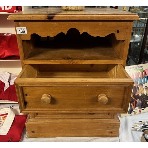 138 - A solid waxed pine bedside chest with 2 drawers & shelf