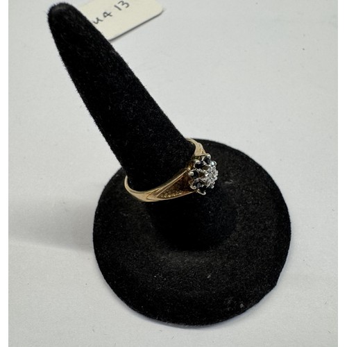 1072 - A diamond & sapphire ring with textured shoulders, HM Birmingham 1976, size L, 2.1 grams.