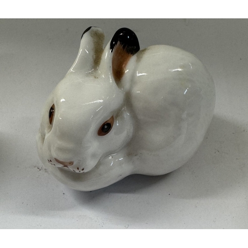 1155 - 3 Russian rabbit figures