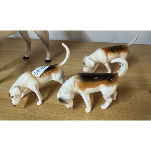 1157 - A Beswick dapple grey horse with rider, Smaller Beswick horse with rider & 3 Beswick hunting hounds