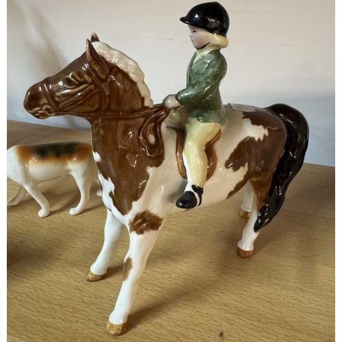 1157 - A Beswick dapple grey horse with rider, Smaller Beswick horse with rider & 3 Beswick hunting hounds