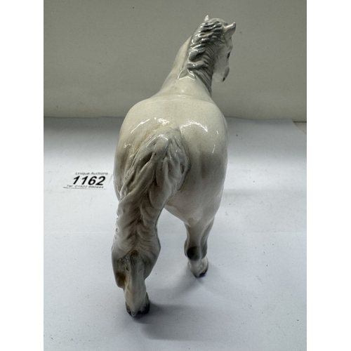 1162 - A Royal Doulton dapple grey horse