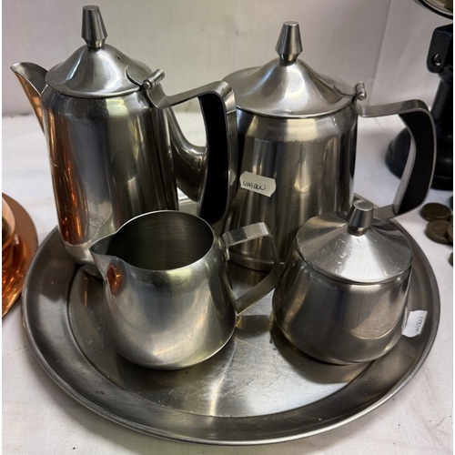 1324 - An Ofida Continental silver plate 5 piece tea set including tray & A copper finish 4 piece tea set i... 