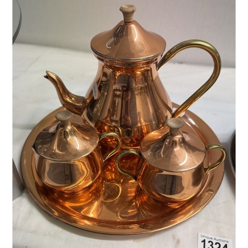 1324 - An Ofida Continental silver plate 5 piece tea set including tray & A copper finish 4 piece tea set i... 