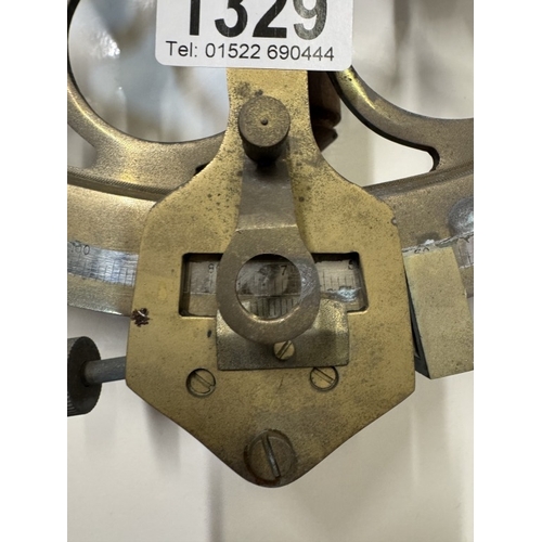 1329 - A brass sextant