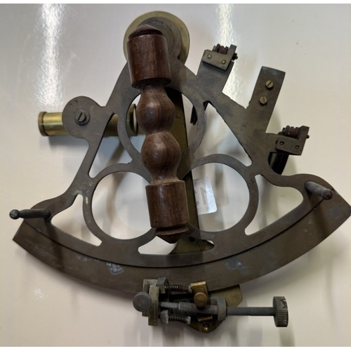 1329 - A brass sextant