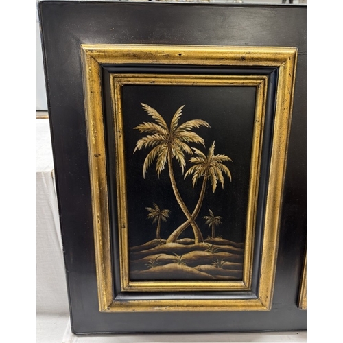 1342 - A classical style gilt & black framed bevel edge mirror with palm tree panels. 112 x 48cm