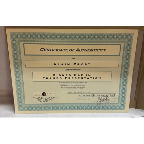 1350 - An Alan Prost collage display with signed cap with certificate of authenticity.