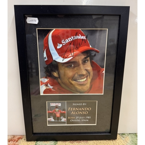 1356 - 2 framed & glazed Fernando Alonso photos & A limited edition Alonso coin