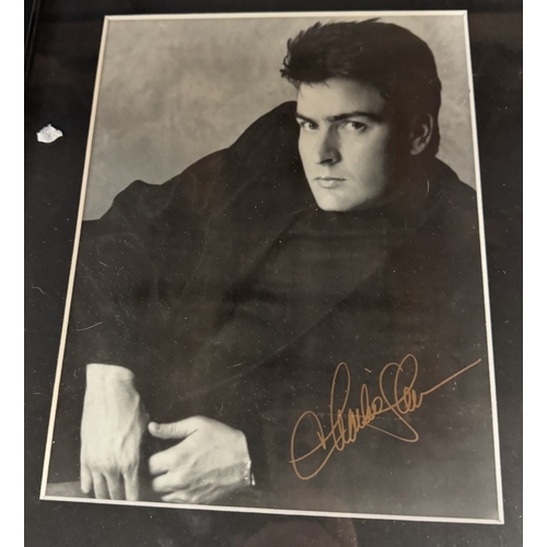 1357 - 2 Framed & glazed Charlie Sheen signed photographs