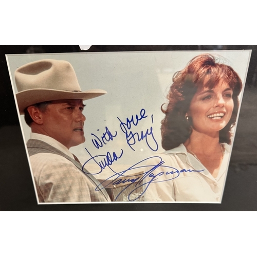 1358 - A framed & glazed Dallas related signed photograph Larry Hagman & Linda Gray