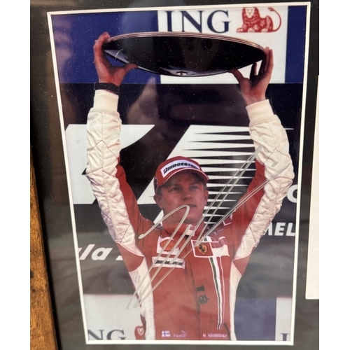 1360 - A framed & glazed signed Kimi Raikkonen photo with certificate of authenticity