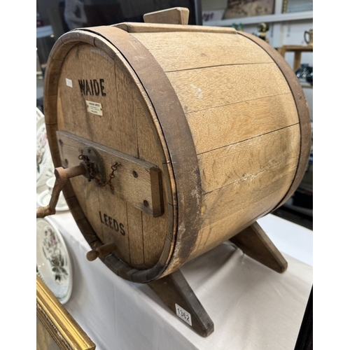 1362 - A 19th / 20th century large oak butter churn by Johnson Bros Spalding for Wade Leeds