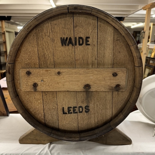 1362 - A 19th / 20th century large oak butter churn by Johnson Bros Spalding for Wade Leeds