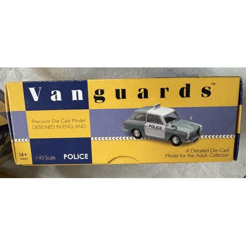 196 - A quantity of boxed Vanguards & Corgi diecast vehicles (All police vehicles)