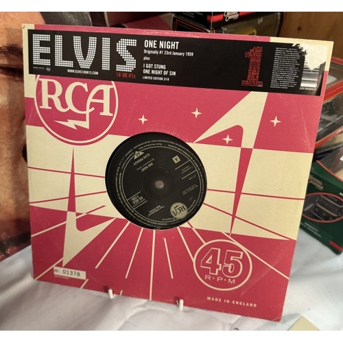 209 - 2 Elvis box sets of LPs including Elvis Aron Presley 25 Anniversary & 18 No 1s 12 Inch singles. (1 M... 